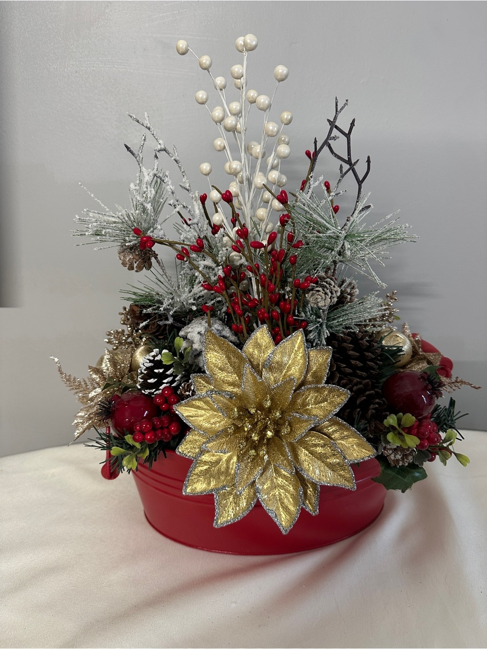 Holiday Centerpiece Arrangement with Gold Poinsettia and Red Accents